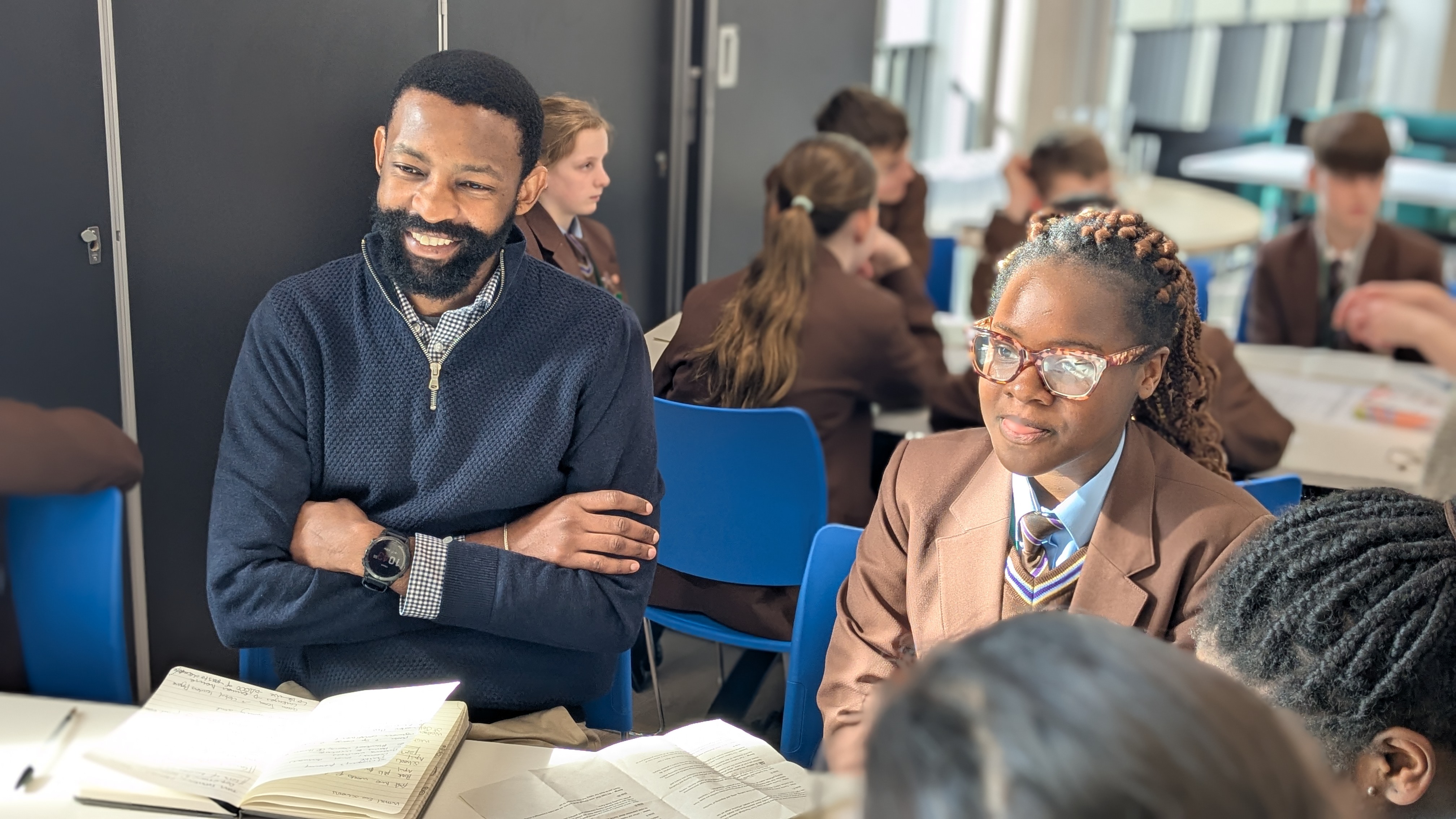 Cyril, one of Hope for the Future's Policy and Engagement Officer's listening to students at the Liverpool World Centre