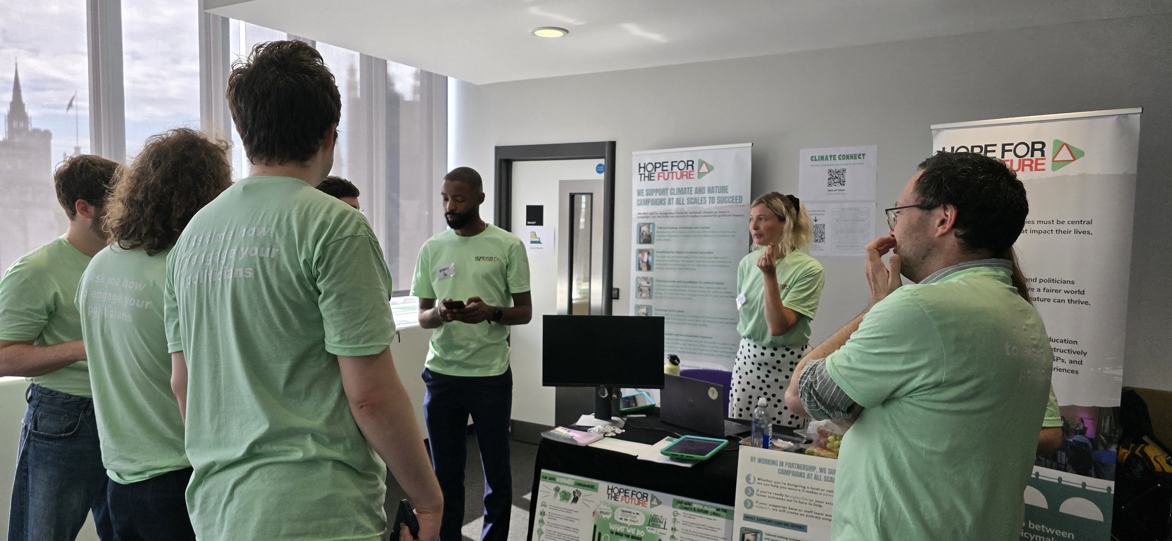 The Hope for the Future Team talking and planning the Mass Lobby activities in an office